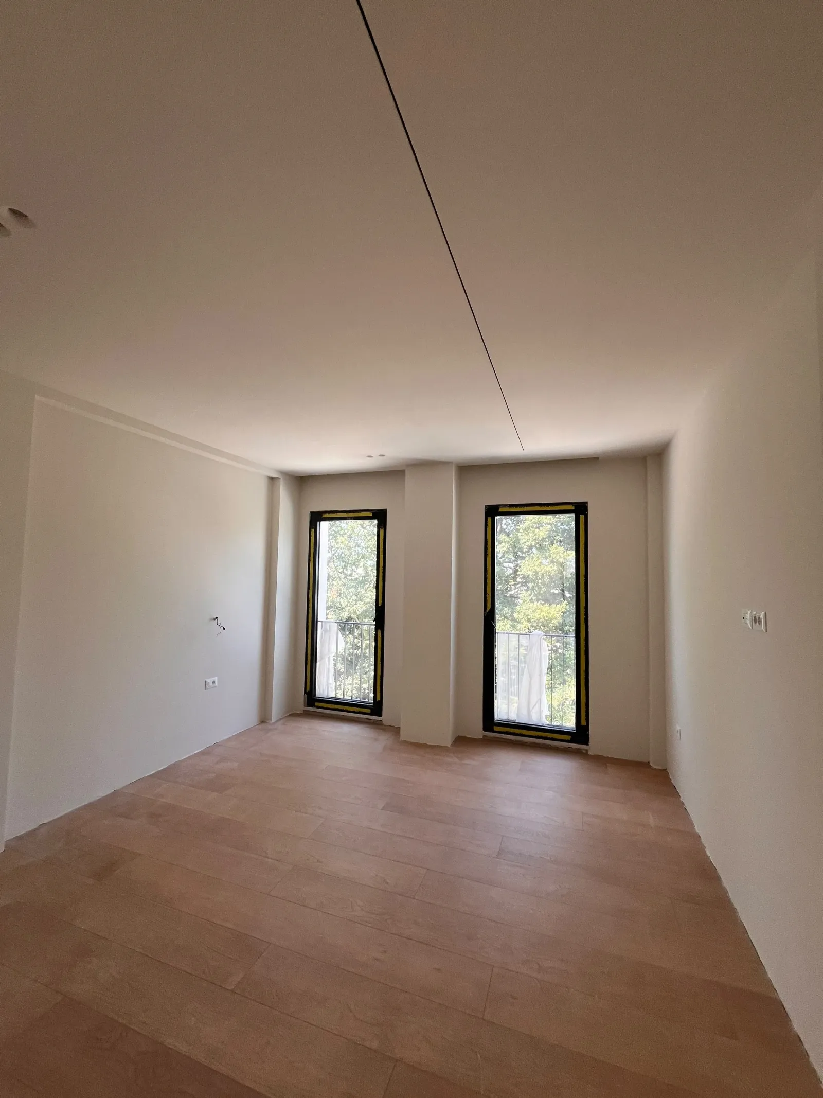 Bedroom with a vaulted gypsum ceiling