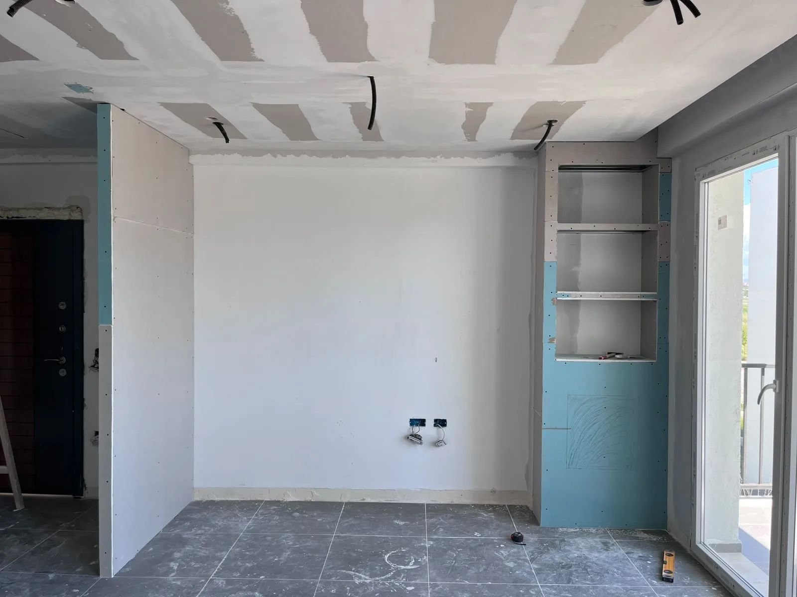 Custom built-in gypsum shelving for a living room