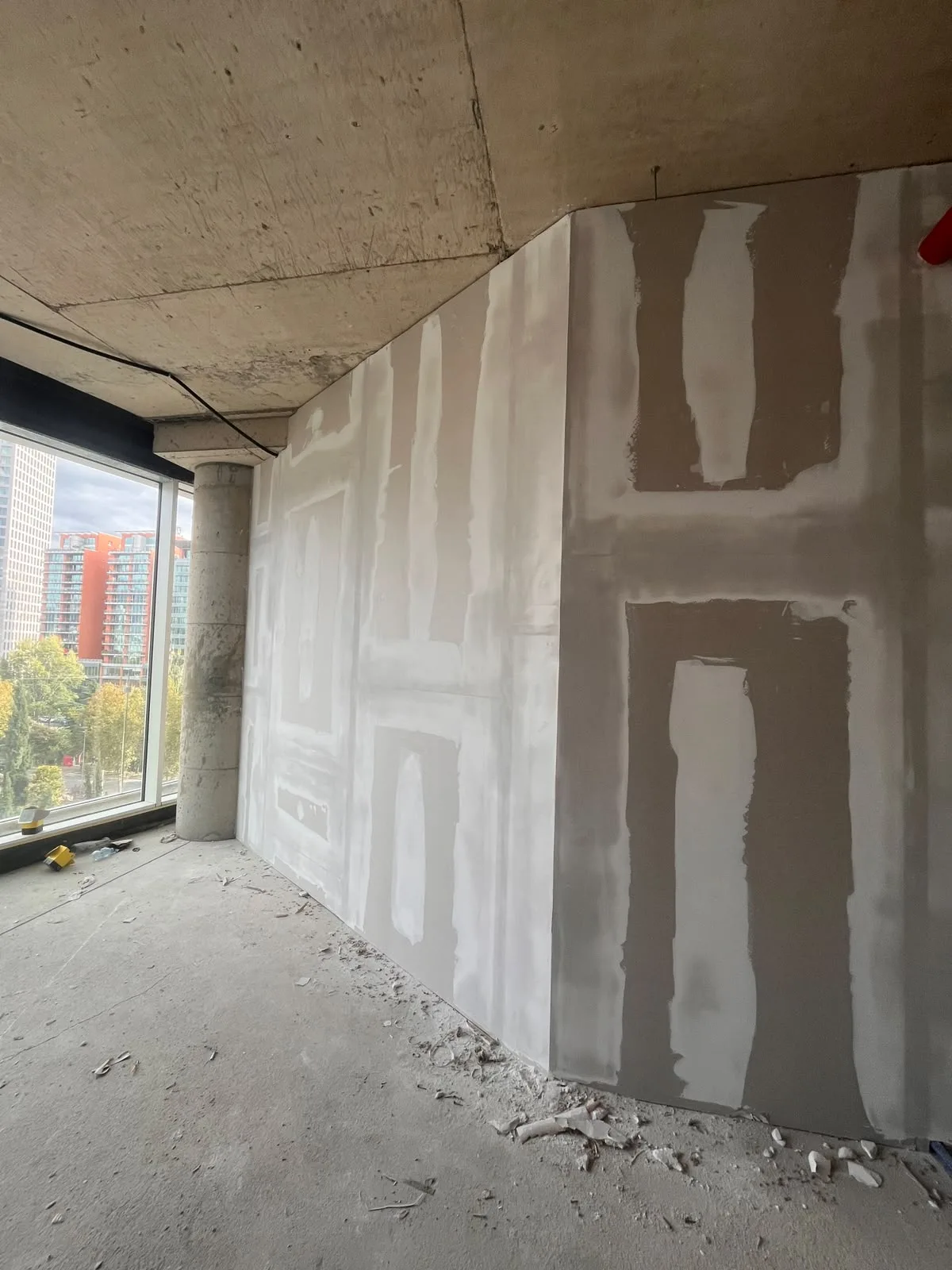 Commercial space plastering with a Tirana view